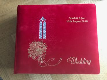 red wedding album on desk