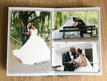 open storybook wedding album on desk