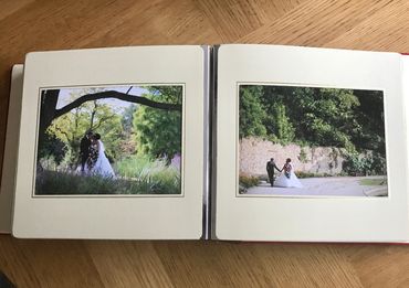 open wedding album on desk