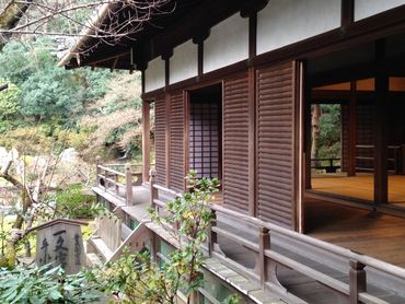 Japanese temple in Kyoto side view with open screens and tatami