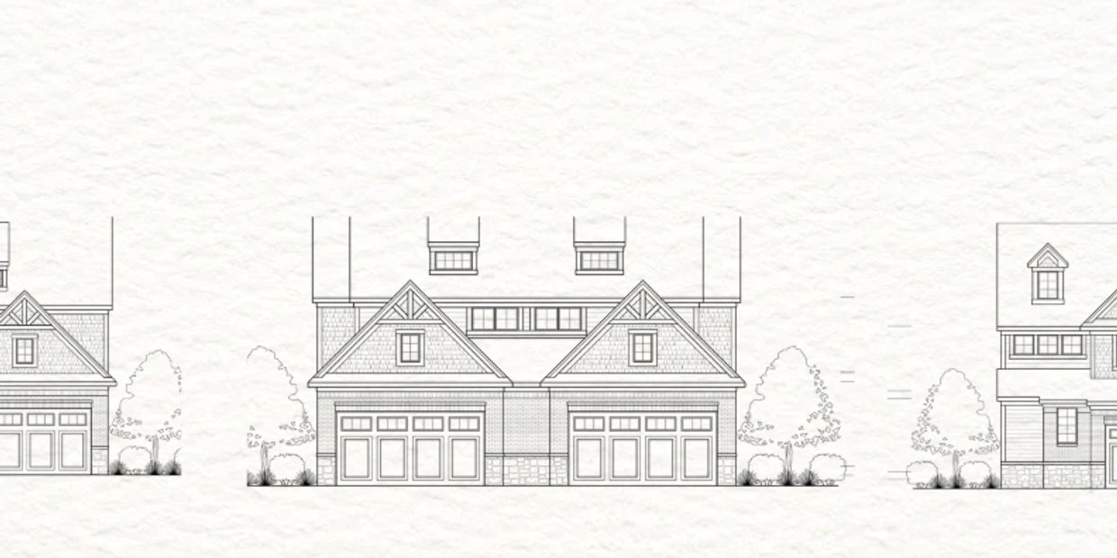 Architectural drawing of a duplex house with garages and dormer windows.