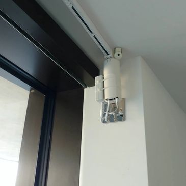 Electric curtain tracks installation.