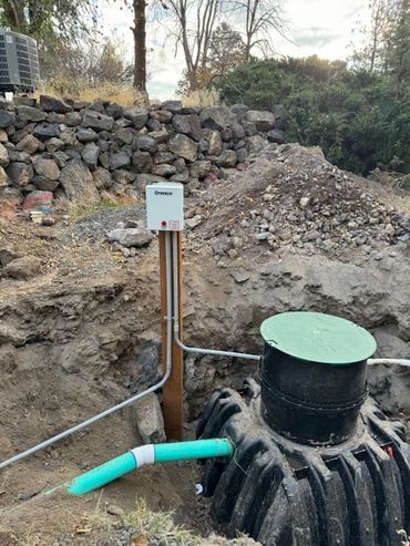 Septic system installation with control panel and electrical wiring