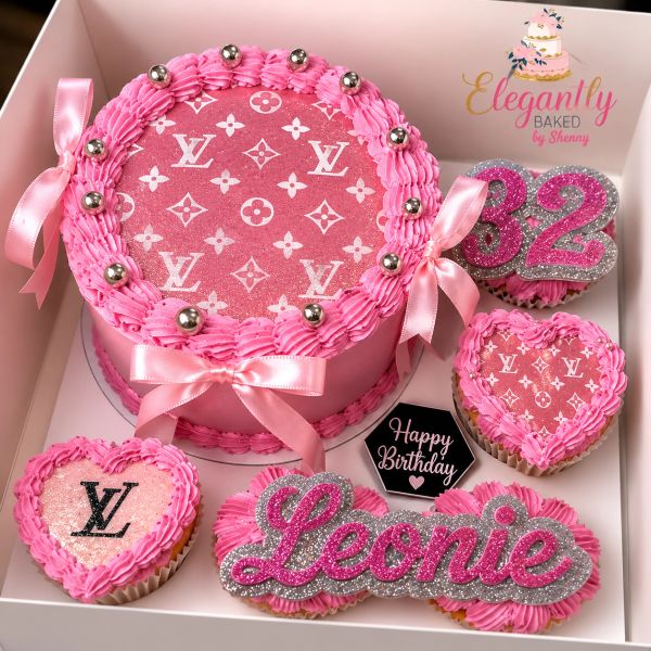 Pink luxury-themed birthday cake set with name and age decorations.