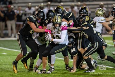 Action photo of a football game in Boonville, IN.
