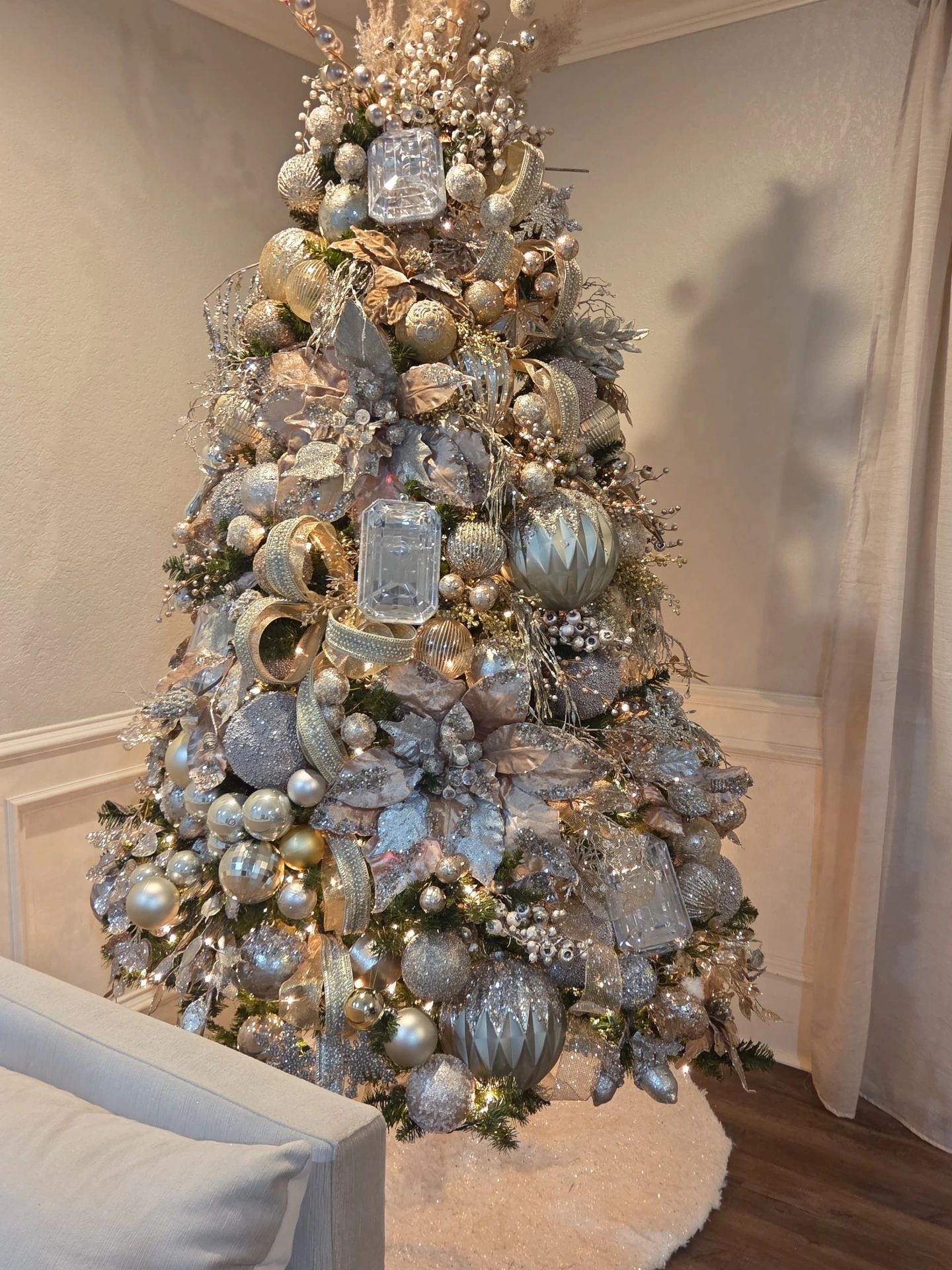 Elegant silver and gold decorated Christmas tree.
