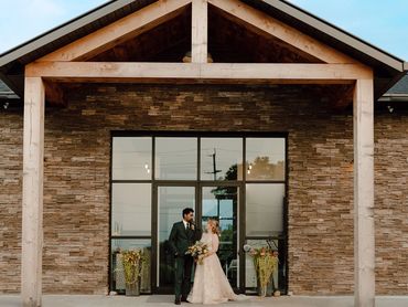 Couple in front of Storehouse 408