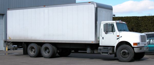 It's a single-unit truck—the cab and the cargo area are on the same chassis.