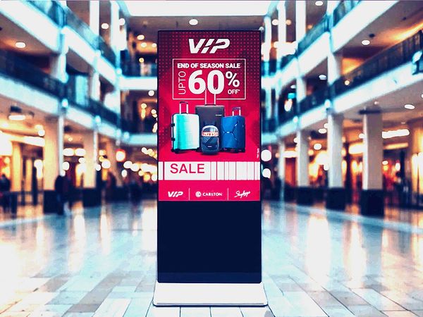 VIP luggage sale up to 60% off in a shopping mall.