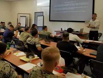 Russell Levy Teaching LSSYB class room of veterans and active duty