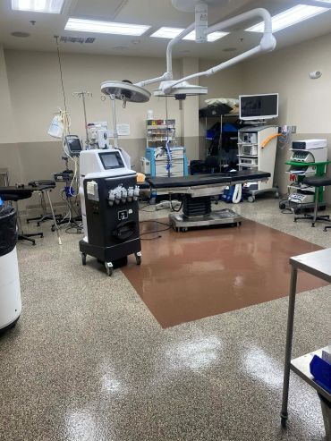 Modern medical operating room with advanced equipment.