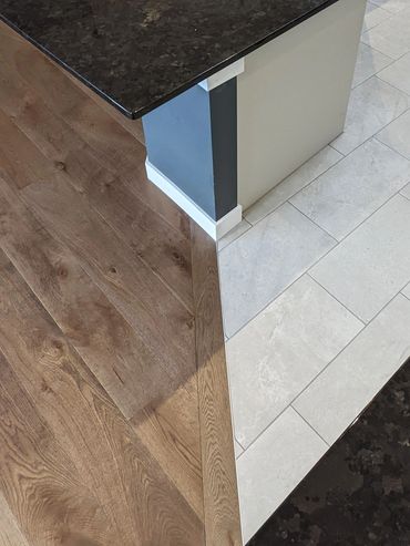 Engineered Hardwood and Glazed Porcelain Tile Flooring, Okotoks, Alberta