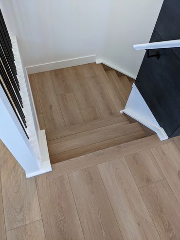 Wide Luxury Vinyl Plank Flooring with Aria Vents, Okotoks, Alberta