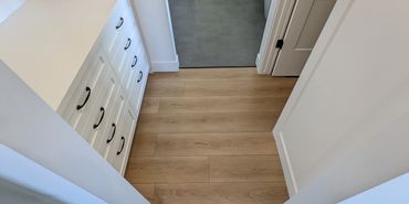Wide Luxury Vinyl Plank Flooring with Aria Vents, Okotoks, Alberta