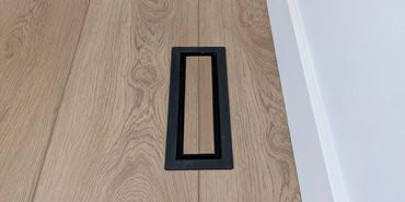 Wide Luxury Vinyl Plank Flooring with Aria Vents, Okotoks, Alberta