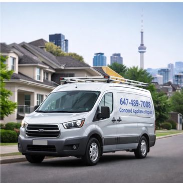 A white repair van parked on a suburban street with city skyline in the background.