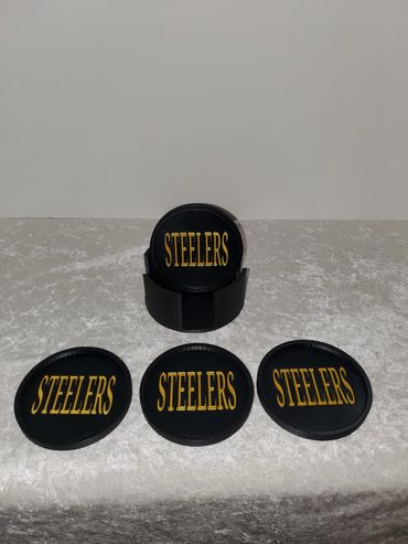 Team themed coaster set with holder and storage box.
