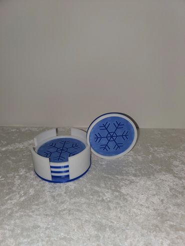 Seasonal coaster set with holder and storage box.