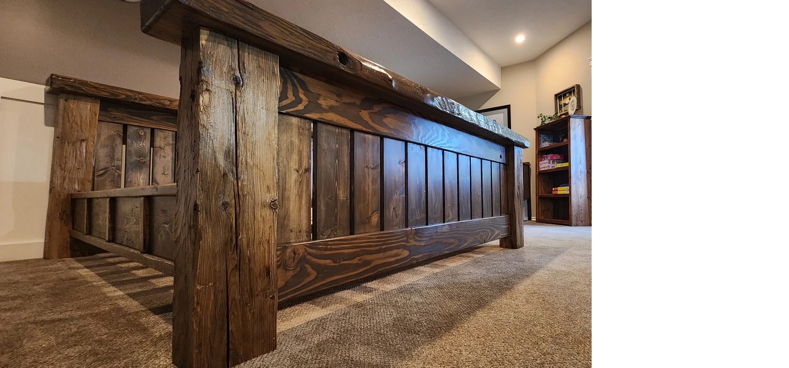 Rustic wooden bed frame with a sturdy design in a cozy bedroom.