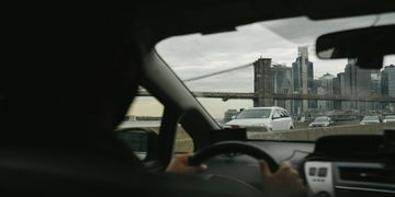 driving a car, car driving in the city, car driving on the bridge