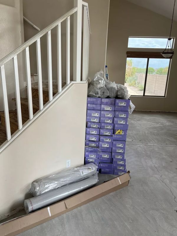 3,500 lbs of flooring hand delivered inside home.