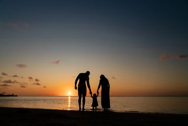 Sunset Family Photo Session - Beach - Outdoor - Mother - Father - Girl - Walking - Sunset - Ocean 