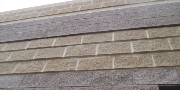 concrete block wall khaki and grey colored