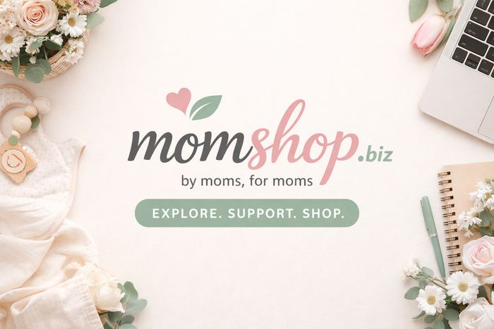 Stack of books next to pencils in a holder and a camera.