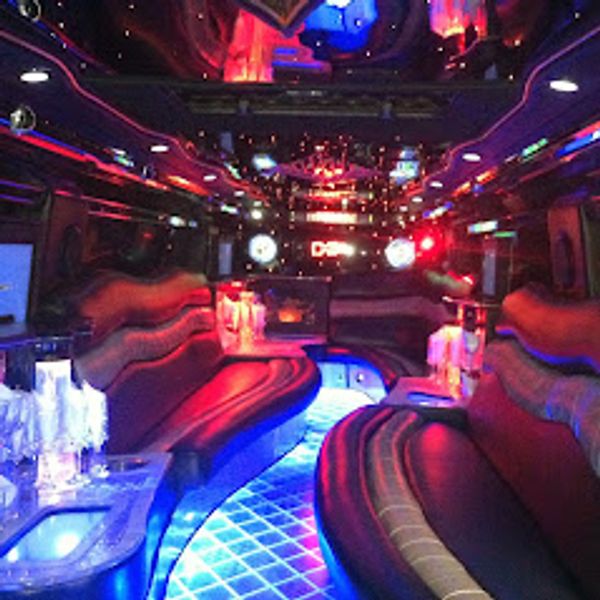 Disco Floor, three Fishtanks, Fireplace, Laser lights, and much more inside of out Hummer Limousine.