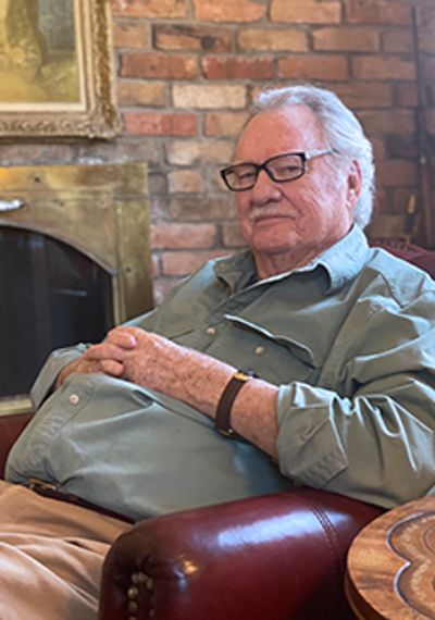 William "Bill" Jochems inside his Redstone home last summer. Photograph by Elizabeth Key.