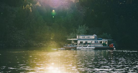 houseboat boat lake fishing skiboat