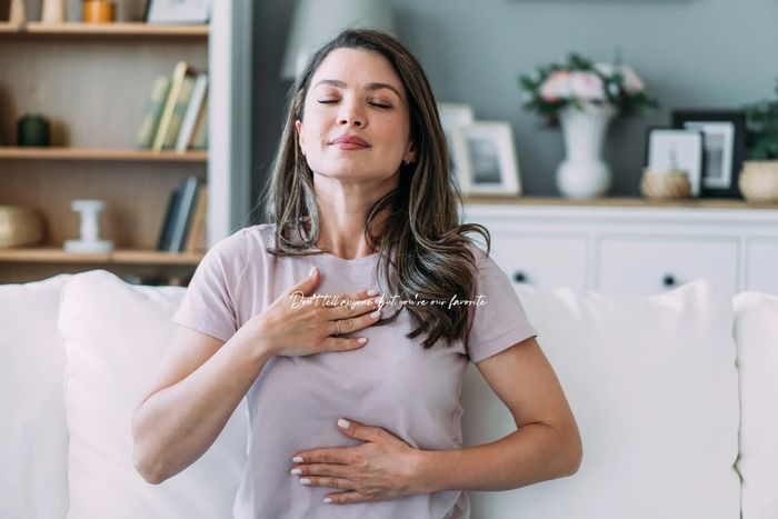 Person taking a deep breath.