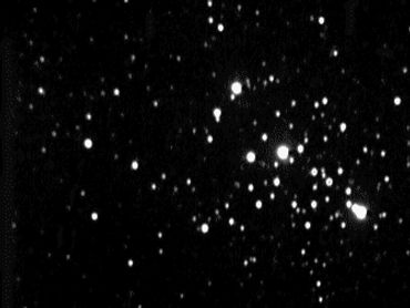 Large cluster rich in stars of magnitude 10 to 11