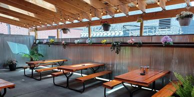 The cozy covered patio at Mother Clucker's Pizza and Muffin Top Cafe
