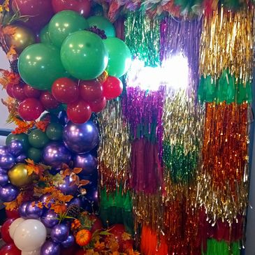 Balloon garlands and neon sign can be added for an additional cost.