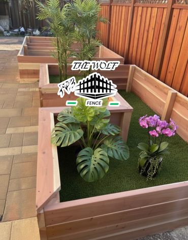 Custom Redwood planter box installation in San Jose by The Wolf Fence.