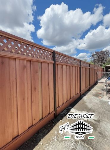 Custom Redwood fence installation in San Jose by The Wolf Fence.