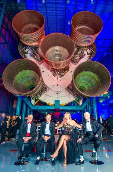 Christina Korp with  Gerry Griffin, Apollo 16's Charlie Duke and Apollo 9 Rusty Schweikart.