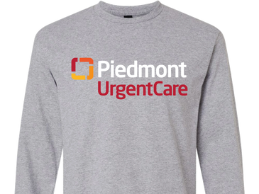 Gray sweatshirt with Piedmont UrgentCare logo in white and red.