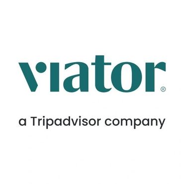 Viator logo with 'a Tripadvisor company' tagline.