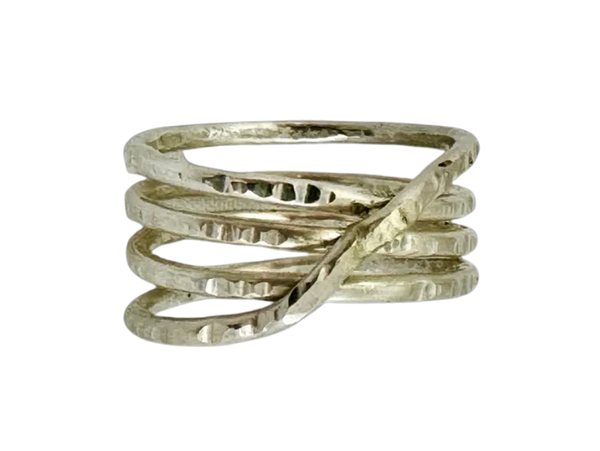 A silver ring with a layered, twisted design.