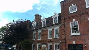 Plaintile roof with bonnit hips and lead gulleys. At Weatherspoons Beccles. Re-roof with dormers