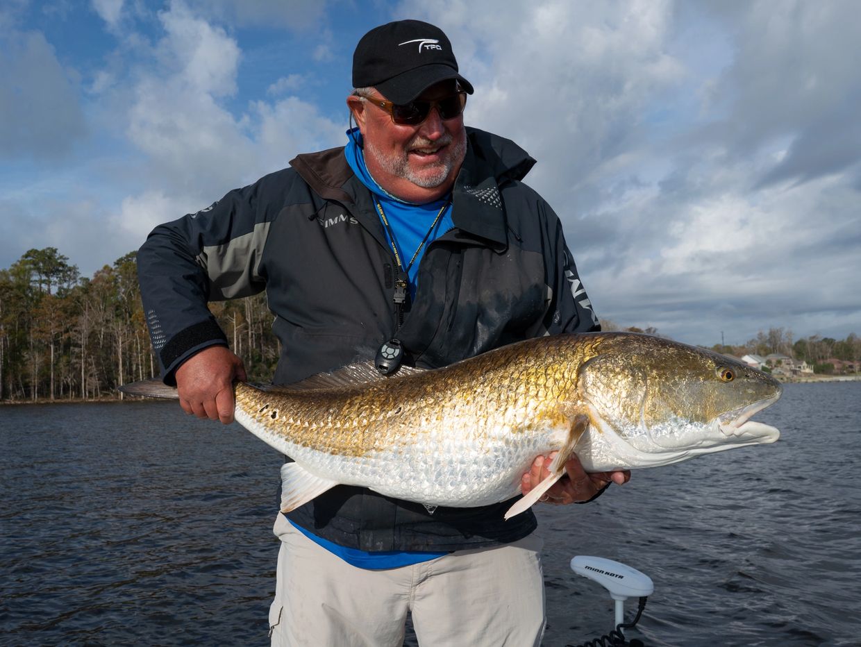 Captain Gary Dubiel owner of Spec Fever Guide Service with a Neuse River, NC trophy redfish