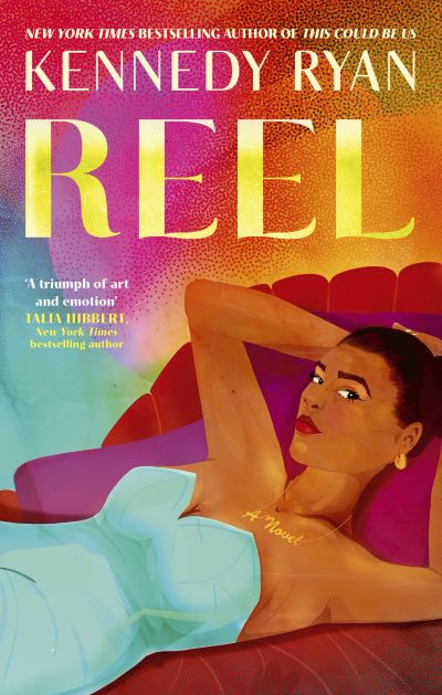 Book cover of "REEL" by Kennedy Ryan featuring a stylish woman reclining on a red couch.