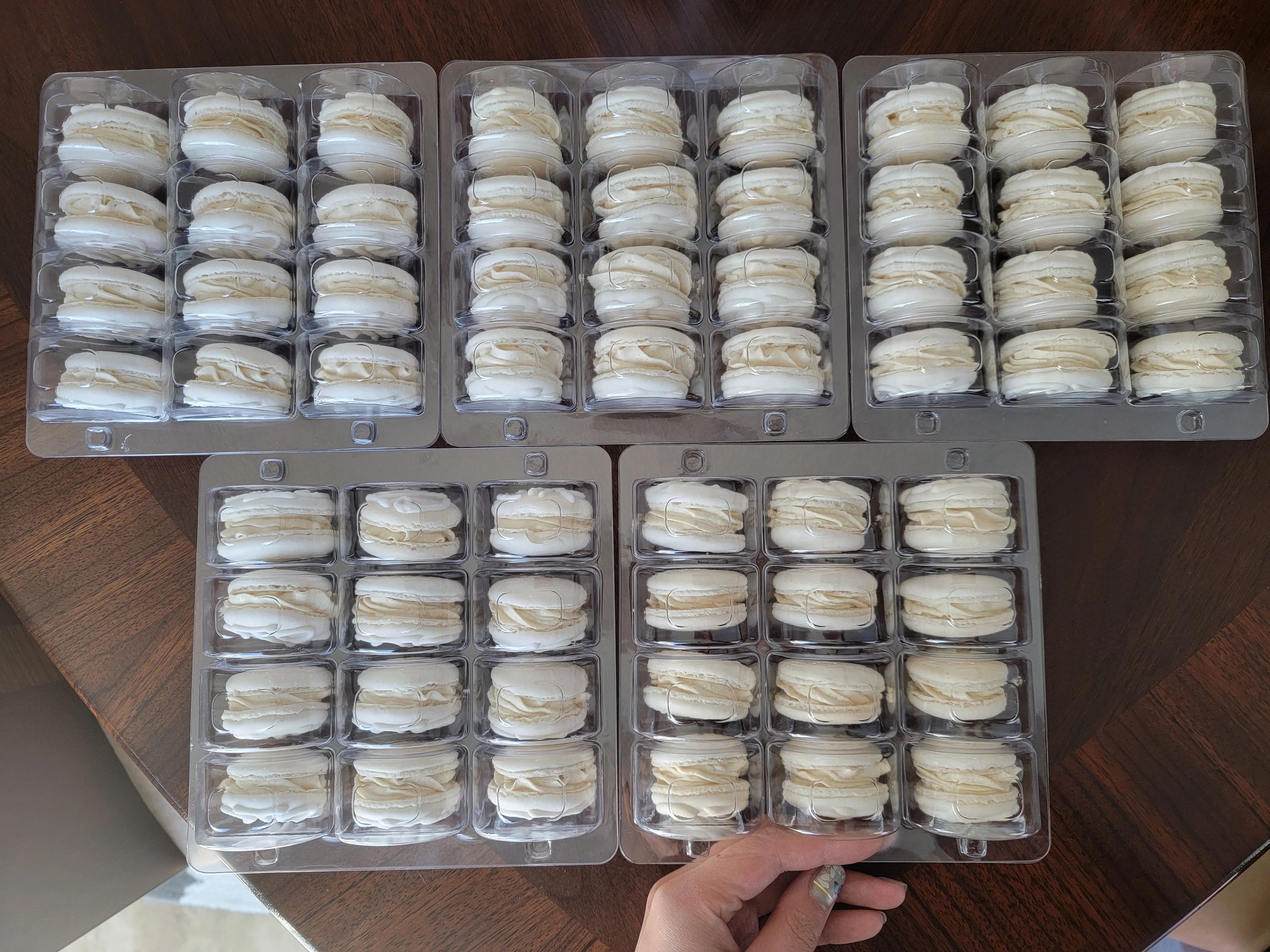 5 dozen white coconut macaron order in clamshell containers