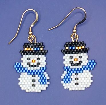 Snowman with blue scarf