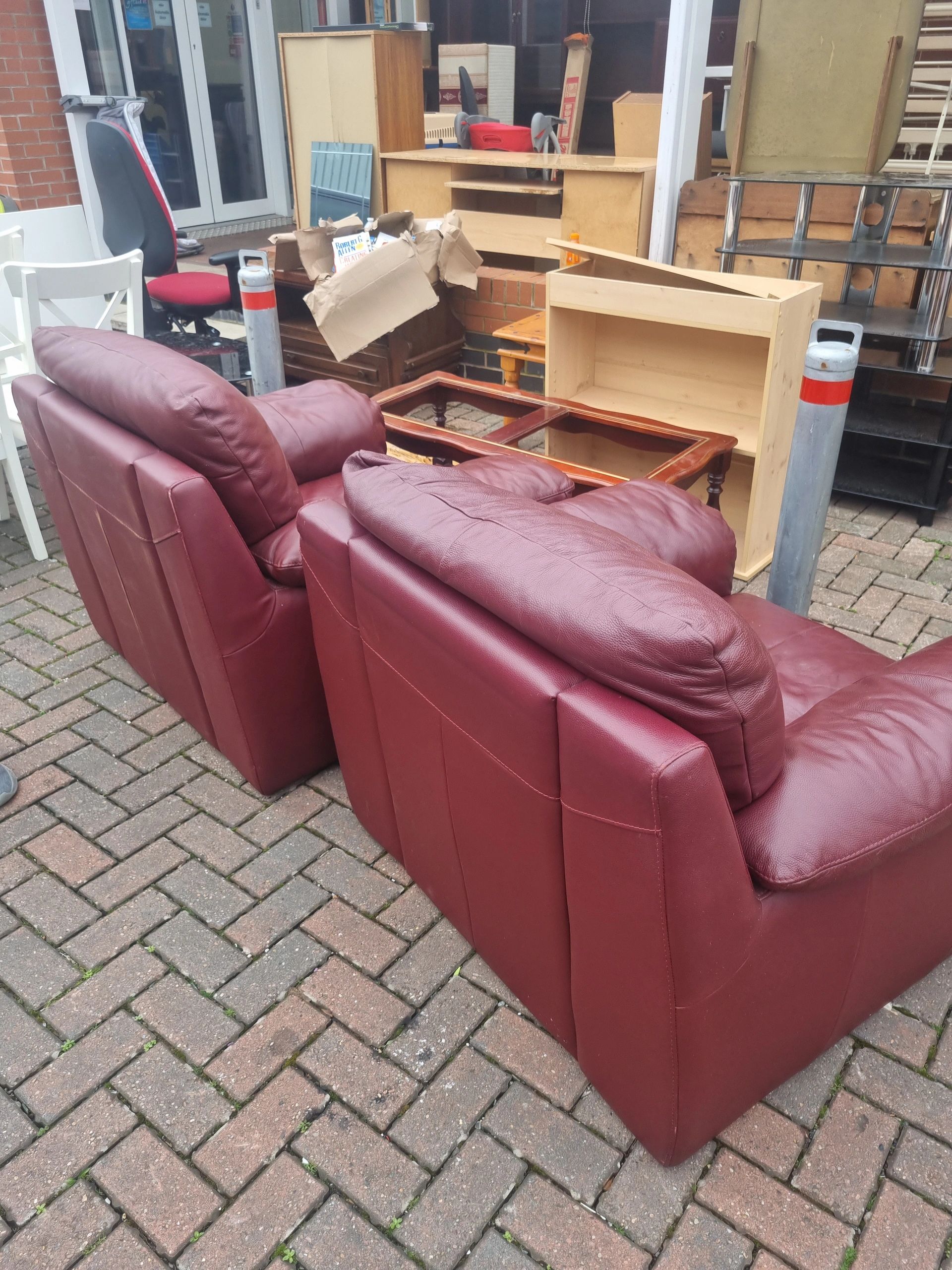 Red Leather Sofas donated to Age UK by us to help save the envioronment