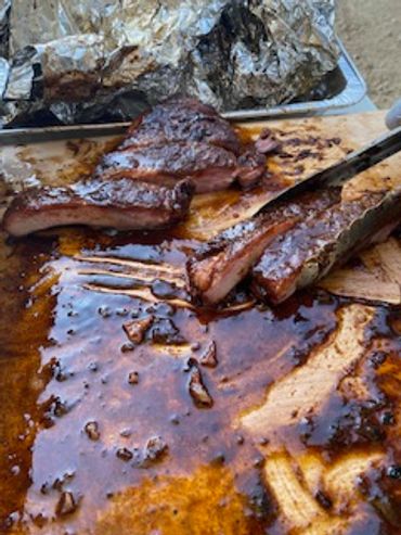 Slow-smoked full rack, seasoned in-house and glazed for bold, tender, unforgettable flavor.