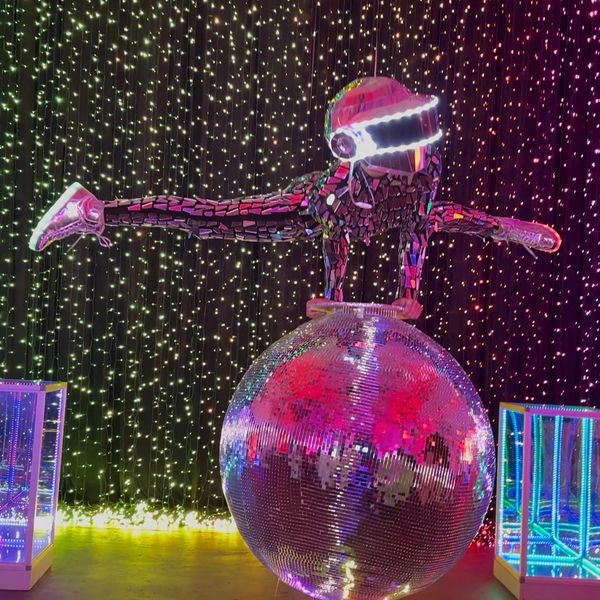 Giant Disco Ball hand balancing act Houston Texas New York LA Miami, giant disco ball contortion