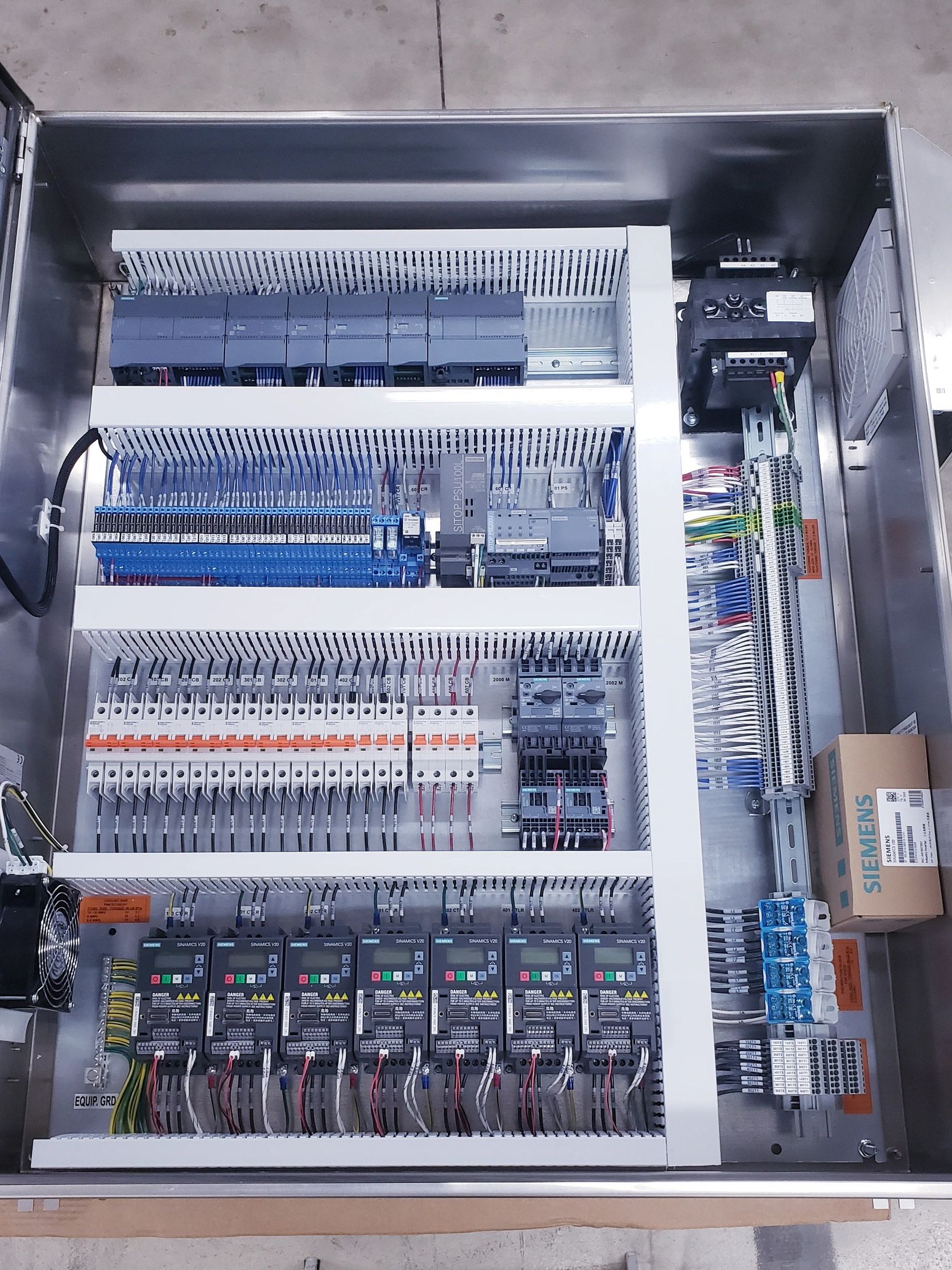 Wash system control panel with 7 drives to control motors and pumps.
